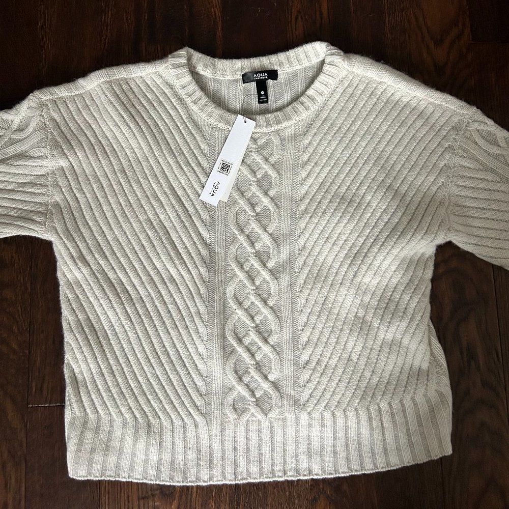 Tags on new cashmere sweater